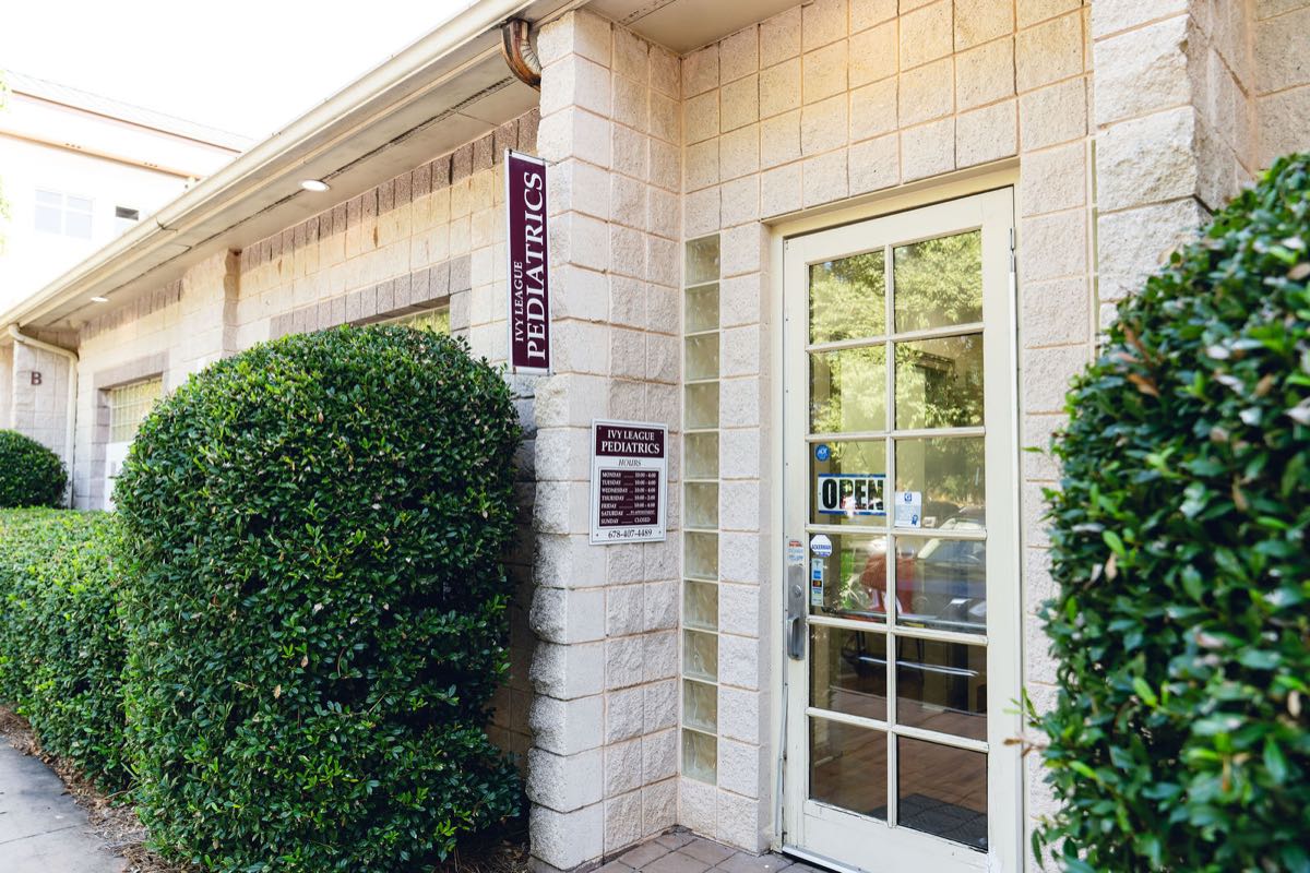 The entrance to Ivy League Pediatrics, with the pediatrics banner beside the door